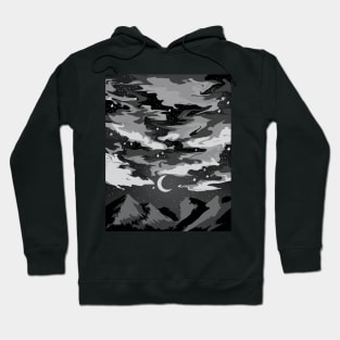 Dark cloudy sky above mountains with a crescent moon Hoodie